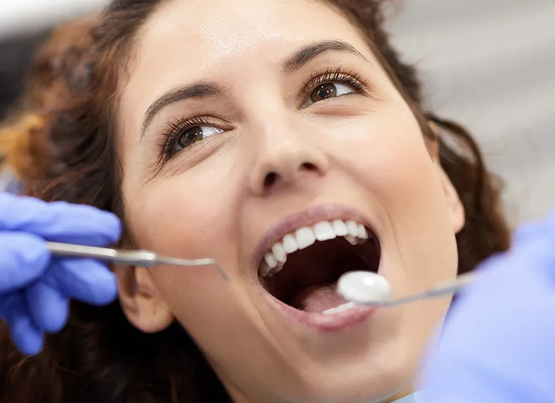 A smiling patient during a dental checkup
