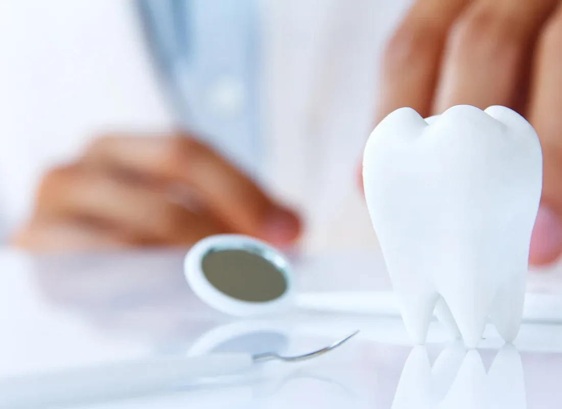 A dentist consulting with a patient
